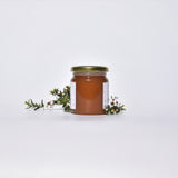 MGO83+ Manuka Multi-Floral Honey. 8cm high, 7cm wide, weighs 250g.